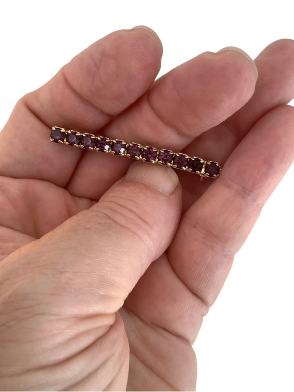 Gold tone Bar Brooch with Deep Purple Cubic Zirconias